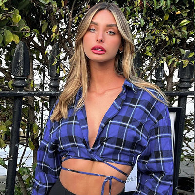 スタイリッシュ プレッド セクシー 女性 ボタンアップ Tシャツ V ネック ロング袖 Tシャツ 腰が低い