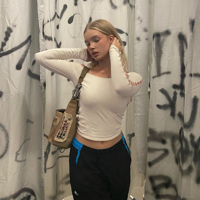 女性用 セクシー ストレートTシャツ スリムライン ストリート ホールアウトTシャツ 長袖