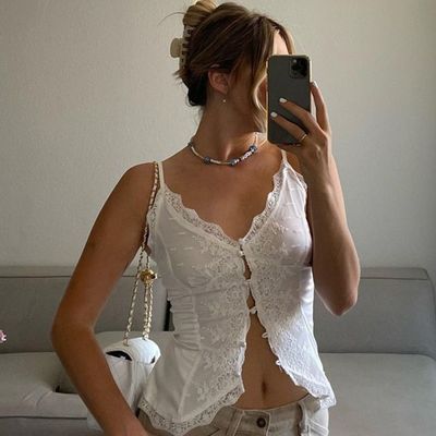 女性のスタイル アメリカン スパイス ガール 蕾子 蕾子 セクシー V ネック カーディガン ストック ハンター 小背心 トップ